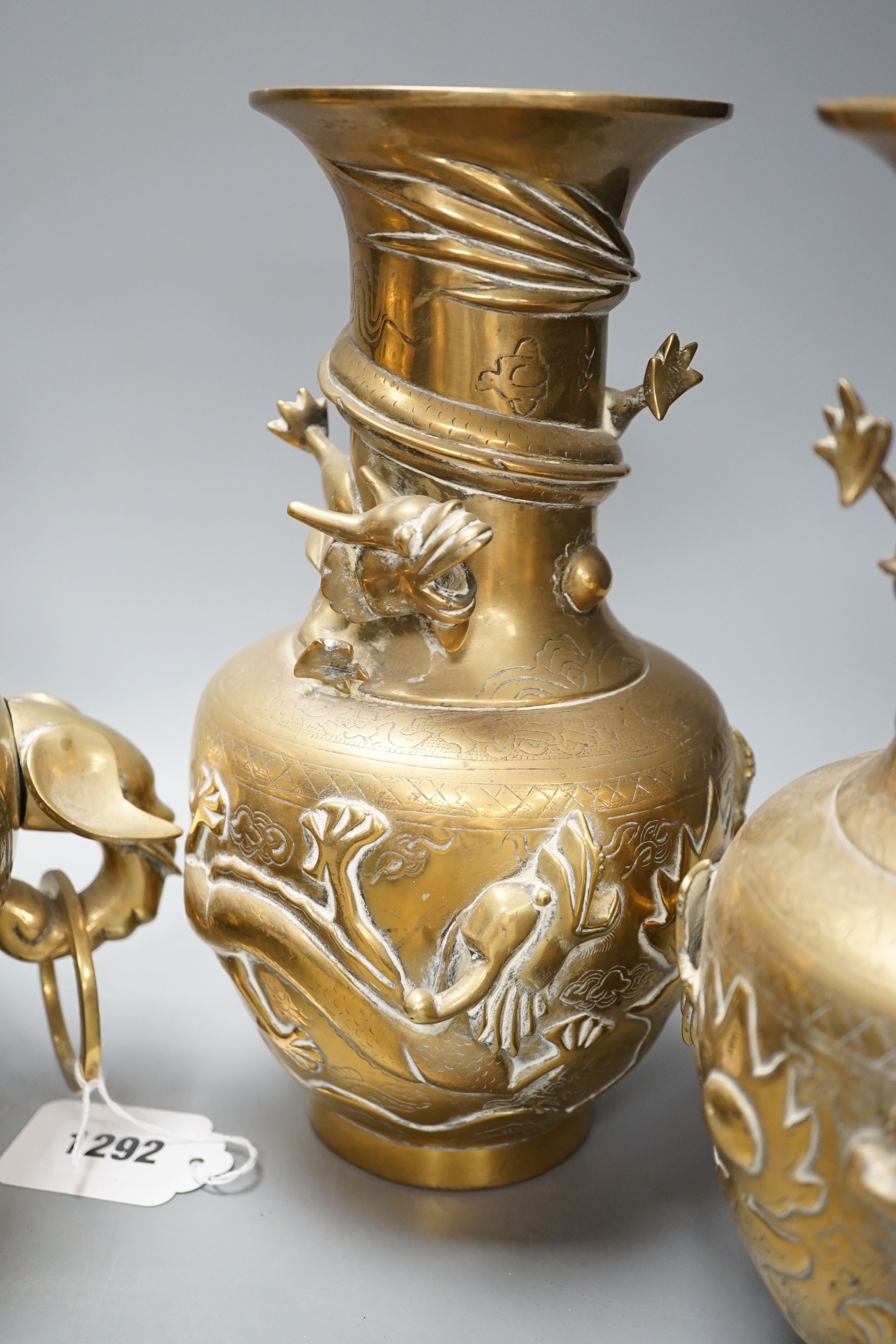 A pair of Chinese brass dragon vases, 26cm, together with two similar incense burners, tallest 30cm high